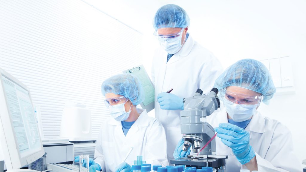 Photo of people in forensic lab - Integrity Cleanroom